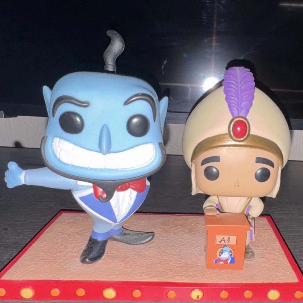 Funko Pop Genie and Aladdin Figures